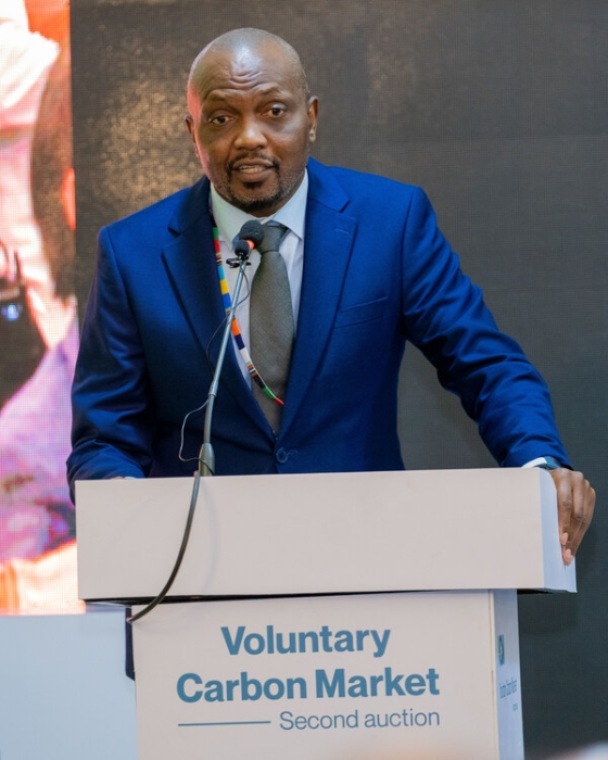 Hon. Moses Kuria, Cabinet Minister, Ministry of Investments, Trade & Industry, The Republic of Kenya, addresses delegates at RVCMC’s largest ever auction of voluntary carbon credits Hon. Moses Kuria, Cabinet Minister, Ministry of Investments, Trade & Industry, The Republic of Kenya, addresses delegates at RVCMC’s largest ever auction of voluntary carbon credits